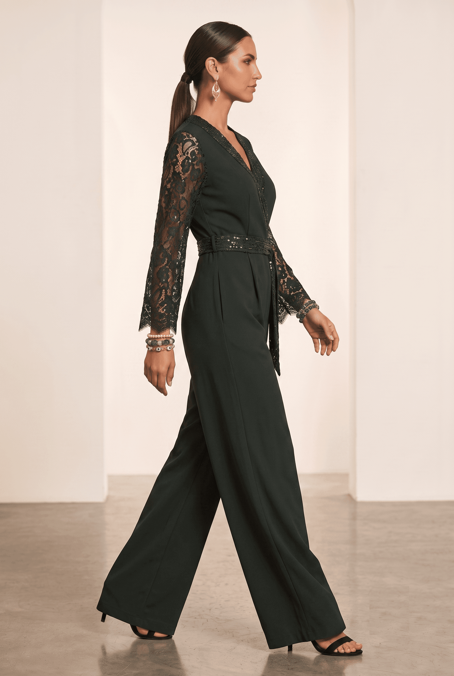 Kamal Indo World – Bottle Green Banana Crepe Party Wear Romper with Hand Embellished Lace