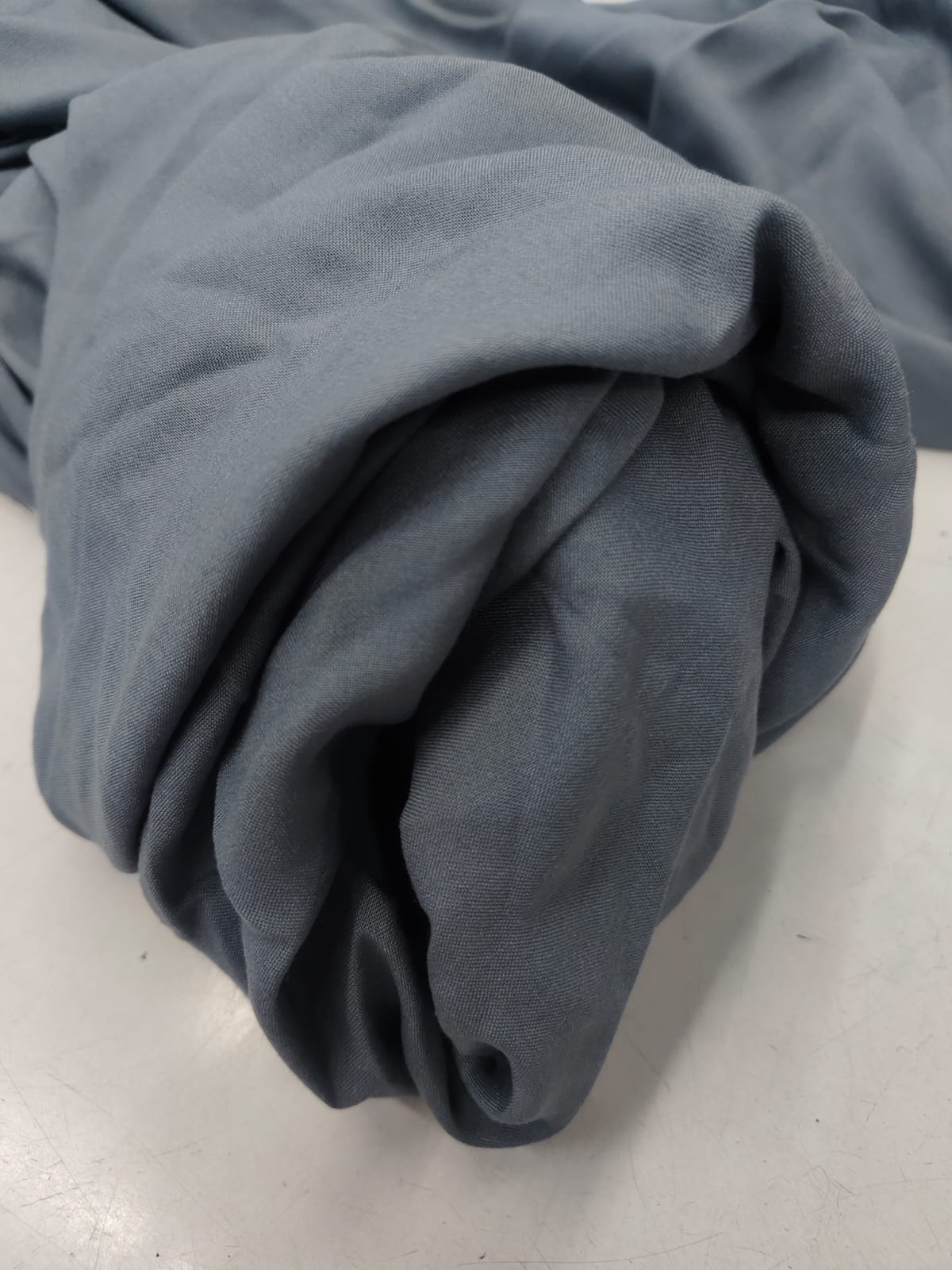 Close-up texture of the blush grey fabric for the Samairaa Zinniars women's coord set.